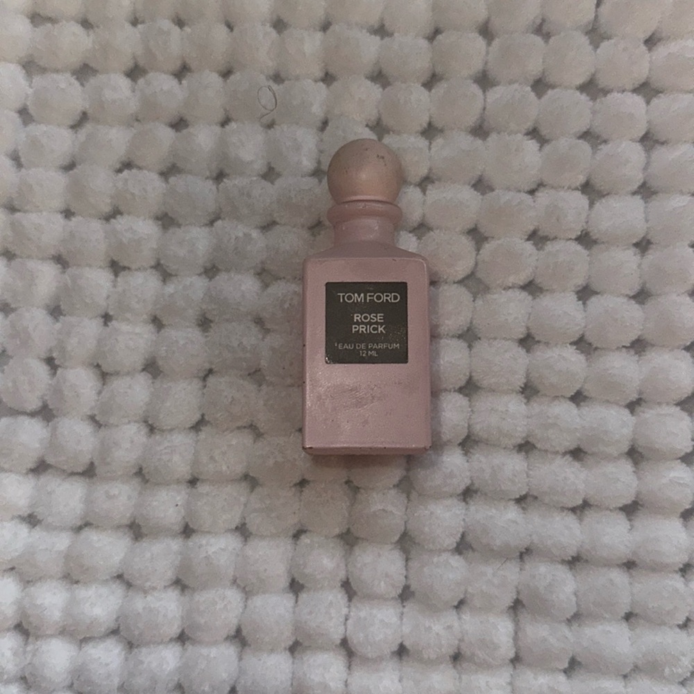 Empty Tom Ford Rose Pick perfume bottle